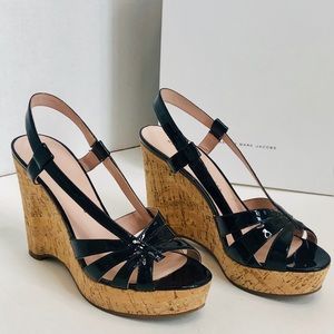 Marc by Marc Jacobs black patent leather sandals.